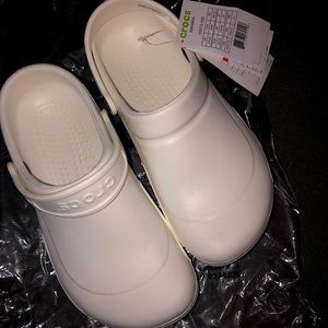 New with tags - White Crocs. Women’s size 8 / Men’s size 6.